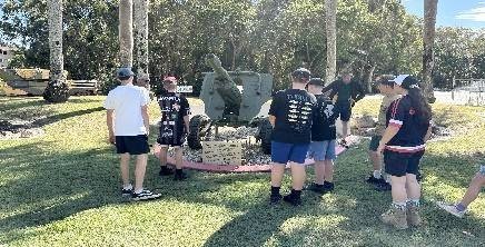 Cadets gathered outdoors on the grounds at Coungeau House