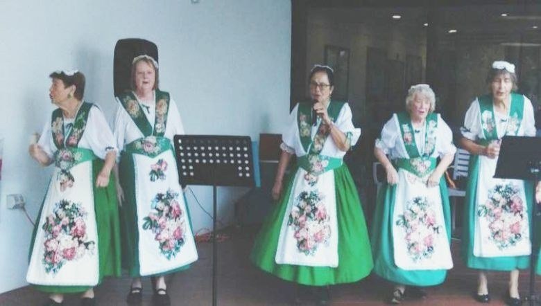The M.L.O.C. Singers performing in costume