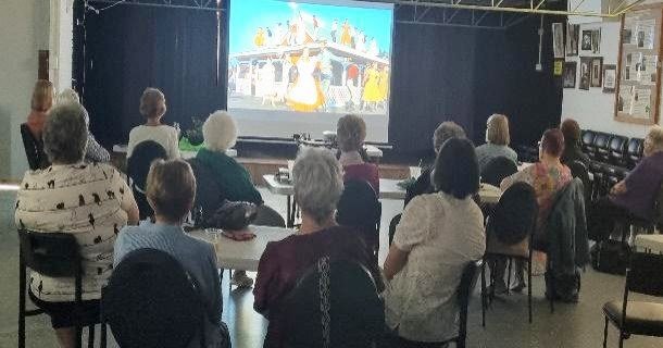 Audience watching a presentation
