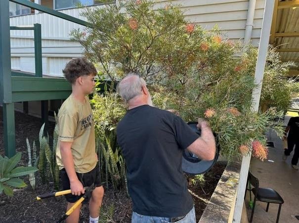 Volunteers working on the garden beds
