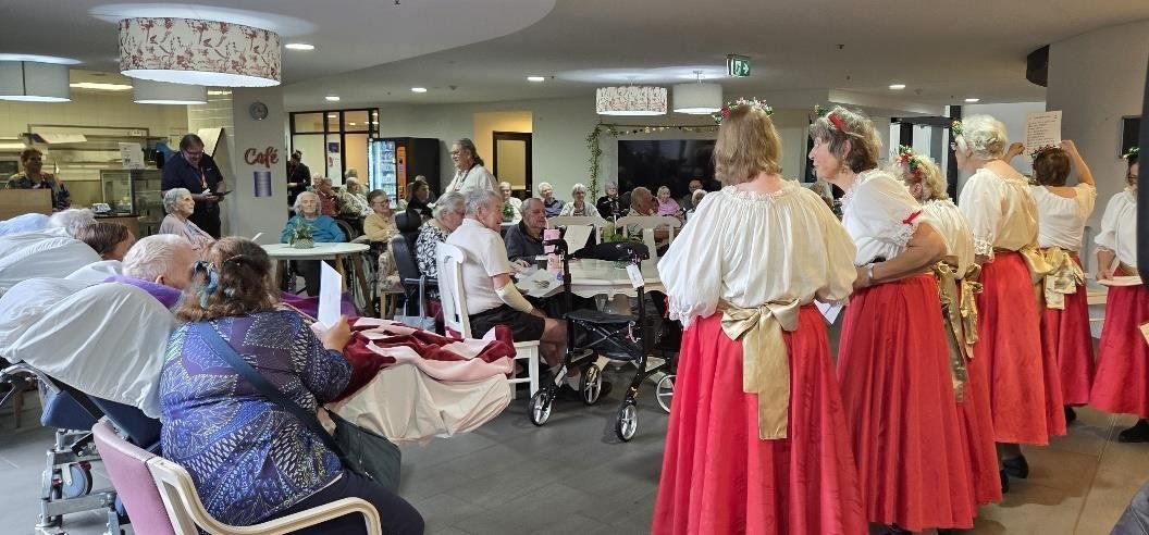 Singers meeting residents after the performance